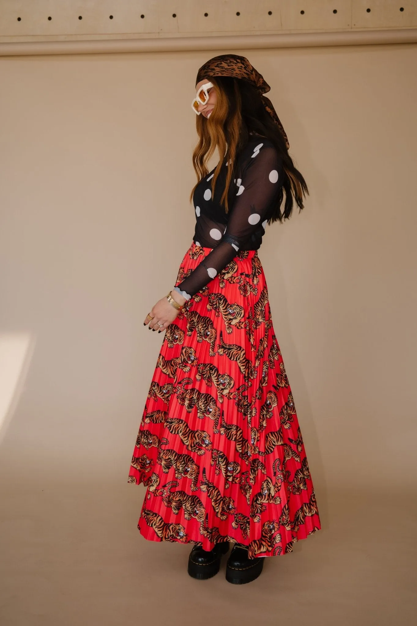 Don't Let Them Tame You Pleated Midi Skirt