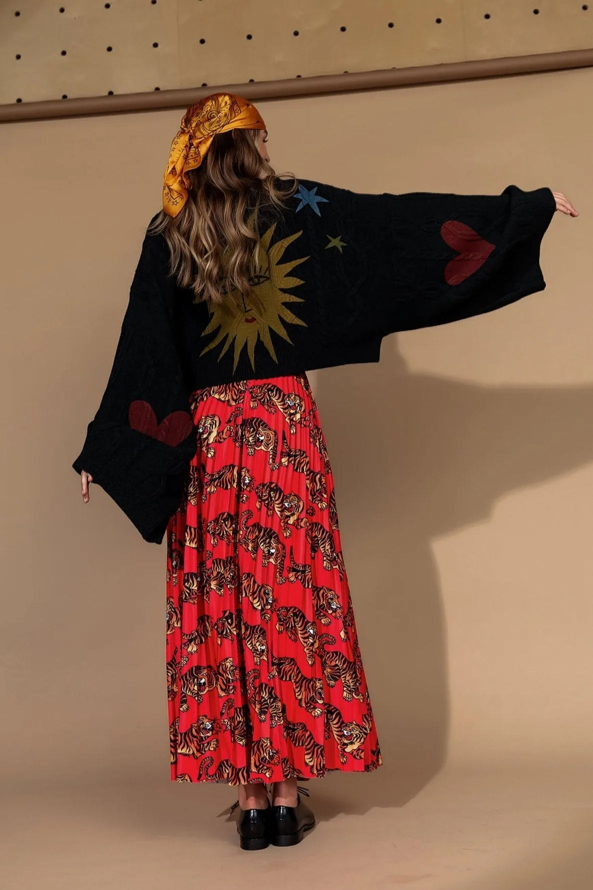Don't Let Them Tame You Pleated Midi Skirt